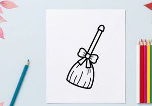 Icono de escoba de bruja con un lazo. Ilustración de escoba mágica de Halloween para diseño festivo.