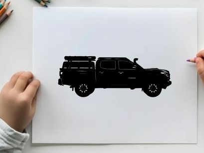 Silhouette of a pickup truck with a camper on the back