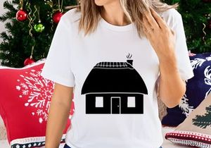 Thatched roof cottage with smoking chimney