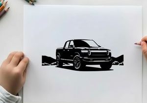 Silhouette of a pickup truck in a scenic landscape with mountains silhouette