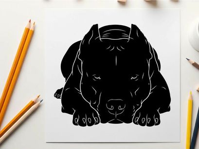 Silhouette of a dog lying down in a relaxed position