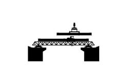 Silhouette of a gantry crane on a dock with silhouette