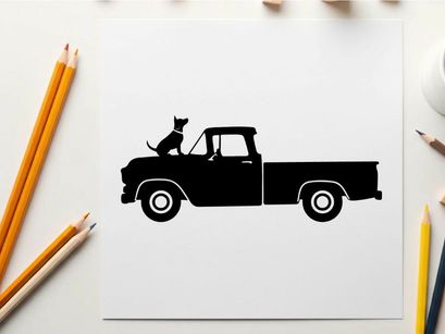 Silhouette of a cat sitting in a vintage pickup truck