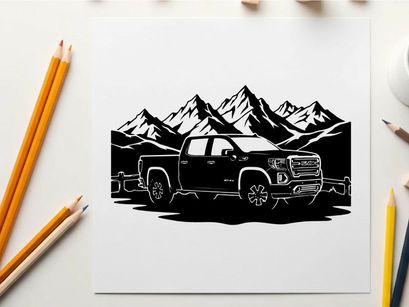 Silhouette of a pickup truck in front of mountains