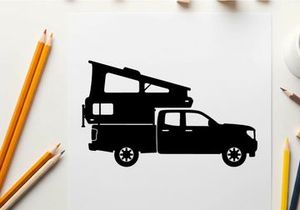 Silhouette of a pickup truck with a camper on the back