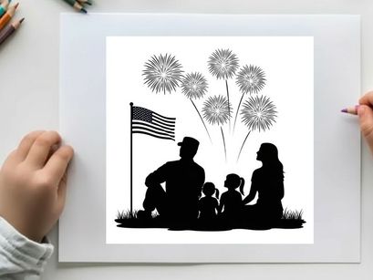 Family watching fireworks display on 4th of july in silhouette