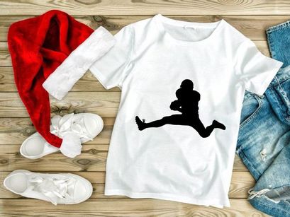 American football player in mid air catch motion silhouette