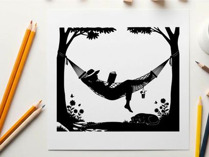 Silhouette of a person relaxing in a hammock between trees