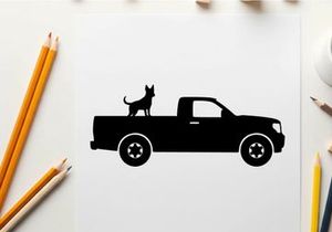 Silhouette of a pickup truck with a dog in the bed