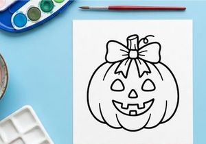 Cute cartoon jack-o'-lantern with bow for Halloween decor. Smiling pumpkin illustration for festive seasonal design projects.