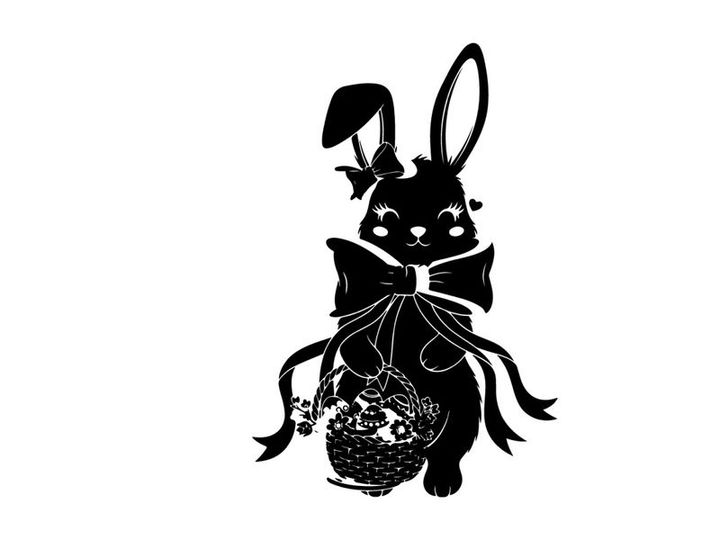 Silhouette of a cute bunny holding an easter basket