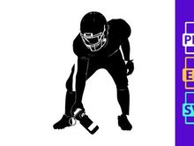 American football player in ready position with ball