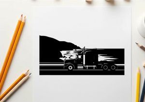 Truck driving along a coastal road in silhouette