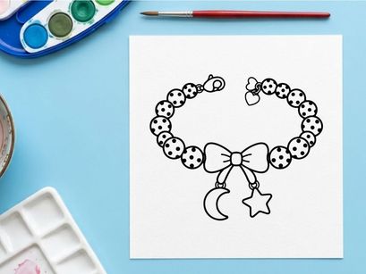 Hand-drawn Halloween charm bracelet with moon and stars. Black and white dotted bead jewelry for spooky season accessories.