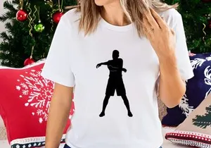 A person in a dynamic stance with arms outstretched in a black silhouette