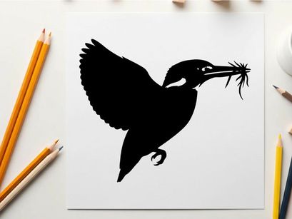 Silhouette of a bird in flight with twigs in its beak