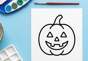 Hand-drawn Halloween jack-o-lantern smiling face illustration. Classic pumpkin with carved eyes and mouth for festive decorations.