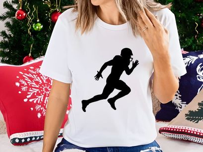 American football player running with ball in hand silhouette