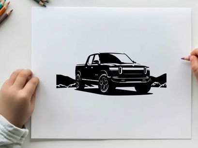 Silhouette of a pickup truck in a scenic landscape with mountains silhouette