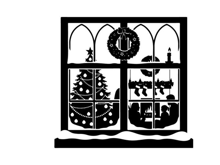 Christmas silhouette through stained glass window
