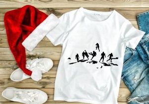 Silhouette of soccer players in action kicking ball on white background
