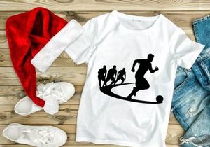 Silhouette of soccer players in action kicking ball with motion trail