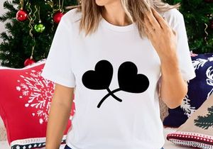 Two Black Heart Leaves on White Background