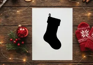 Black silhouette of a Christmas stocking isolated on a white background
