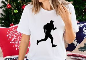 Silhouette of a man running with a backpack on in a dynamic pose