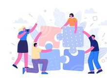 People putting puzzle pieces