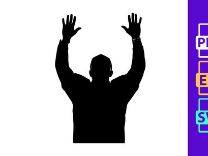 A silhouette of a man with his hands raised up in the air in celebration or triumph