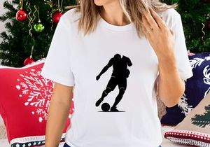 Soccer player kicking a ball in action on the field