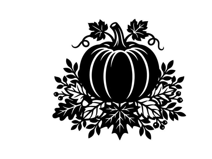 Silhouette of a pumpkin with autumn leaves for fall harvest decor