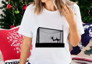 Soccer goalkeeper diving to block a shot on goal in a soccer match