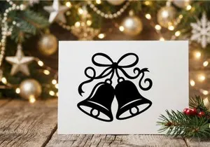 Black and white Christmas bells icon with decorative bow isolated on white background