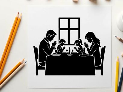 Family in silhouette praying at dinner table together