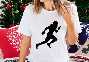 American football player running with ball in hand silhouette