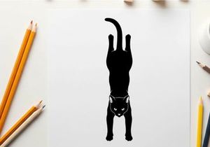 Black cat silhouette doing a handstand on white background