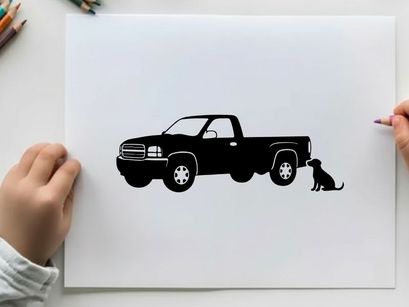 Silhouette of a pickup truck with a dog