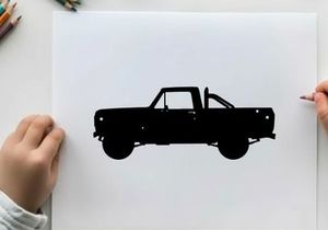 Silhouette of a classic pickup truck against a white background