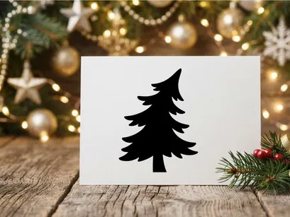 Black silhouette of a Christmas tree isolated on a white background