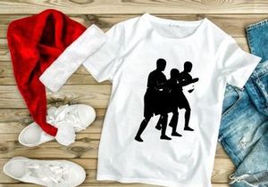 Three silhouetted men in traditional dance or martial arts movement