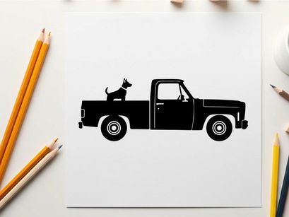 Silhouette of a dog in the back of a pickup truck
