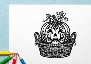 Dekorativer Halloween-Kürbis mit geschnitztem Gesicht in einem Weidenkorb