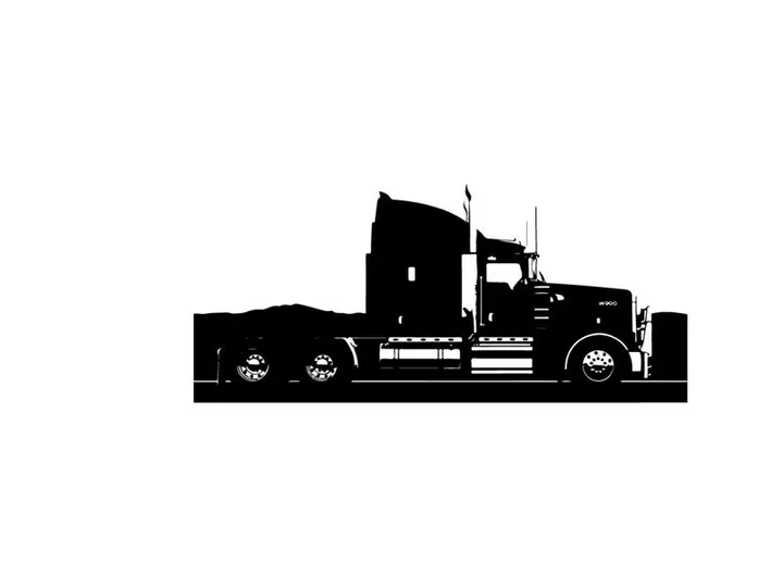 Silhouette of a semi truck on the road