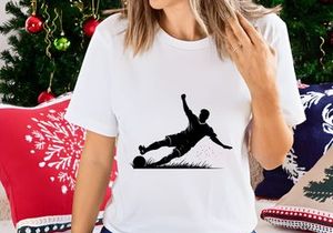Soccer player in dynamic action sliding tackle on field