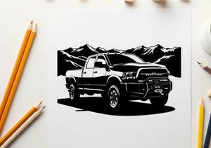 Silhouette of a pickup truck in front of mountains