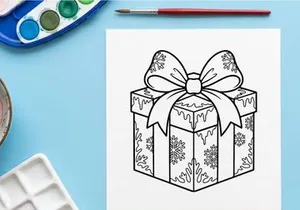 Christmas gift box with snowflake pattern and large bow, black and white line art drawing.