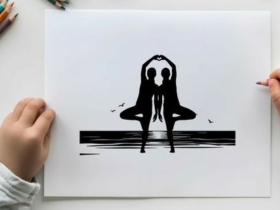 Silhouette of two people in yoga pose at sunset