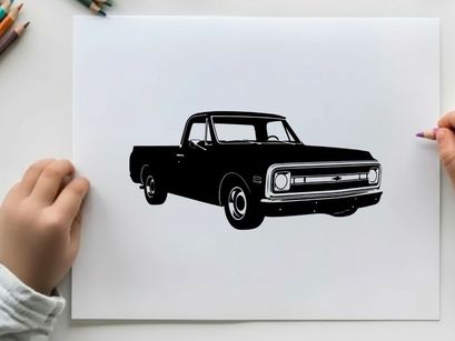 Silhouette of a classic pickup truck with chrome accents